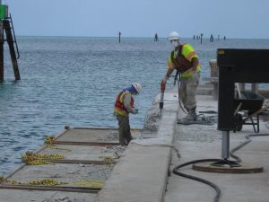 precon marine worker repairing bulkhead warf in Andros Island, Bahamas