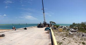Crane on Bahama pier to assist in bulkhead repairs