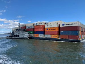 Precon Marine tugboat moving cargo on a boat