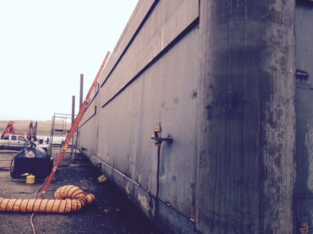 maintenance on barge getting ready for submersion
