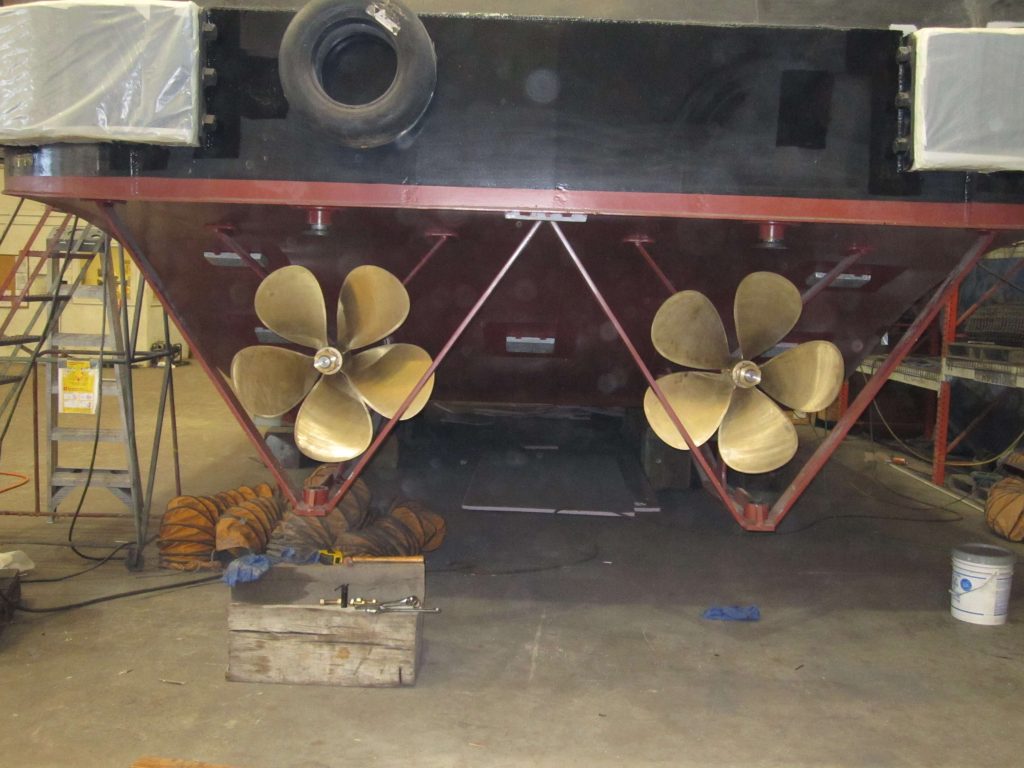 refurbished propellers of a barge after repairs