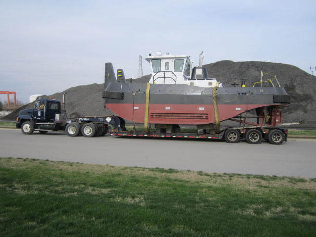 tugboat being transported to the Chesapeake river