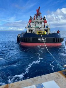 Precon Marine tugboat pulling barge